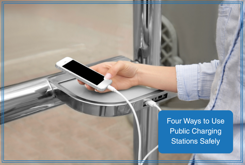 Close-up of a person plugging a smartphone into a public USB charging station, illustrating safe public charging practices.